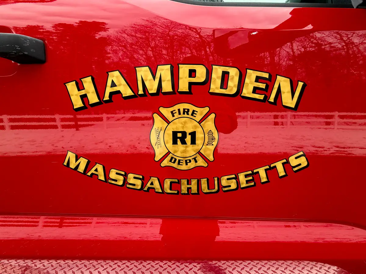 Door emblem close-up reading Hampden Massachusetts Rescue.